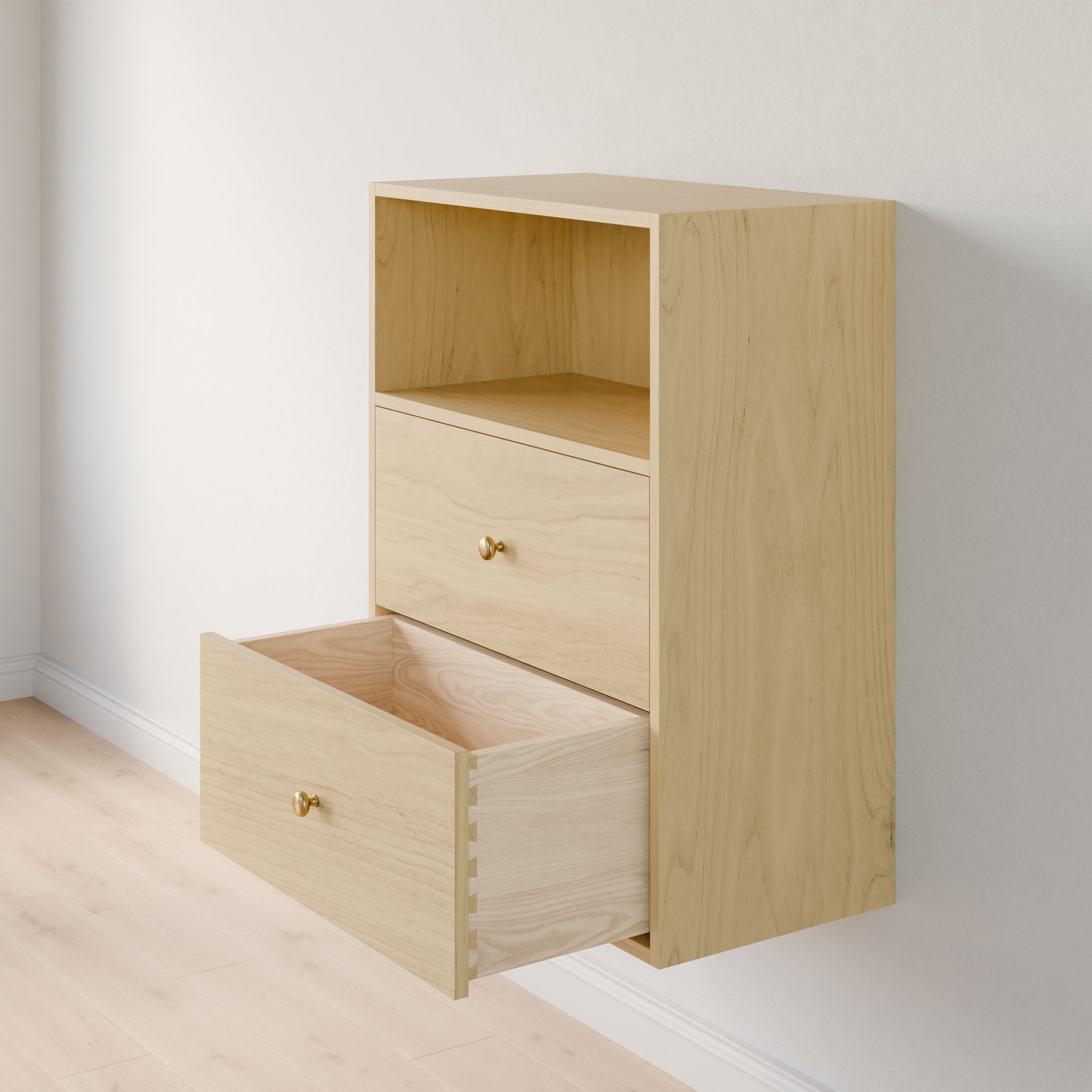 The Krovel Furniture Co. Closet Drawers and Shelves in Maple is a wall-mounted cabinet crafted from premium plywood featuring two drawers (one open, one closed), a shelf, and elegant golden round knobs. It's set against a white wall with matching light wood flooring beneath. #configuration_single-shelf-double-drawer