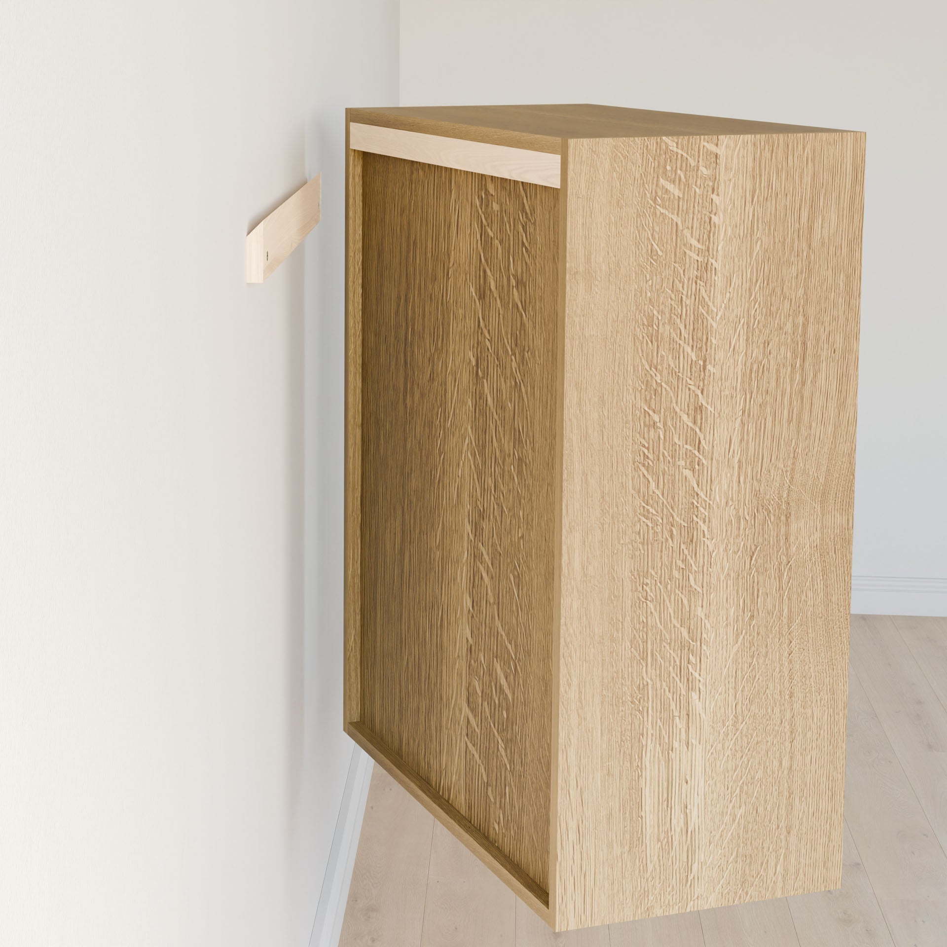 The Closet Drawers and Shelves in White Oak by Krovel Furniture Co. gives the impression of floating beside a white wall, held up by a discreet bracket. Made from premium plywood with a light wood finish, it seamlessly integrates with the light floor and wall without visible hardware. #configuration_triple-shelf