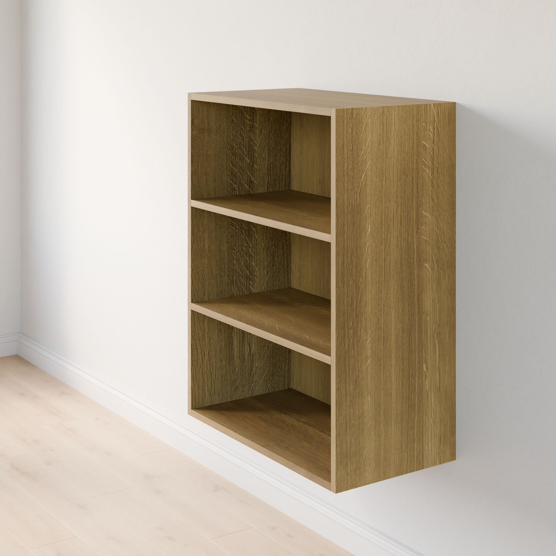 The Closet Drawers and Shelves in White Oak by Krovel Furniture Co. is mounted on a white wall. The shelves are empty, complementing the room's light wooden floor. With its minimalist design and natural finish, it blends functionality with style seamlessly. #configuration_triple-shelf