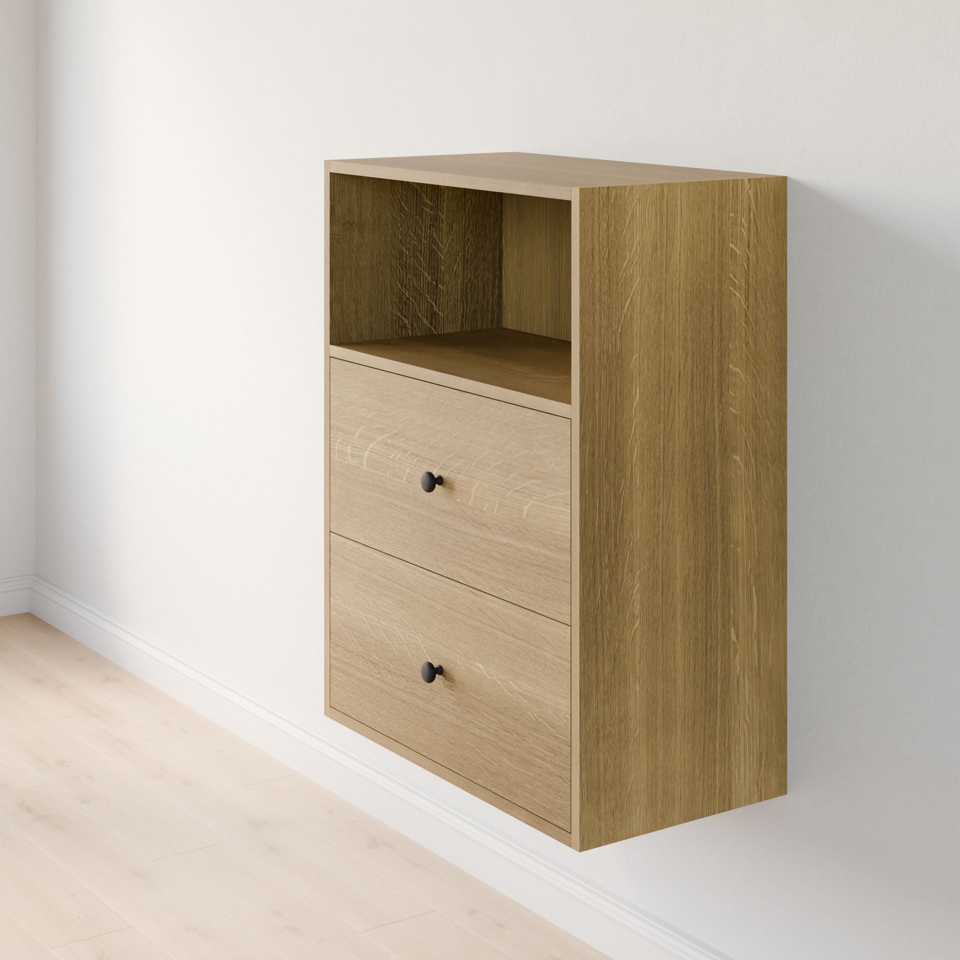 The Krovel Furniture Co. Closet Drawers and Shelves in White Oak features premium plywood, two drawers, an open shelf with black knobs, and complements minimalistic modern modular systems against light walls and floors. 