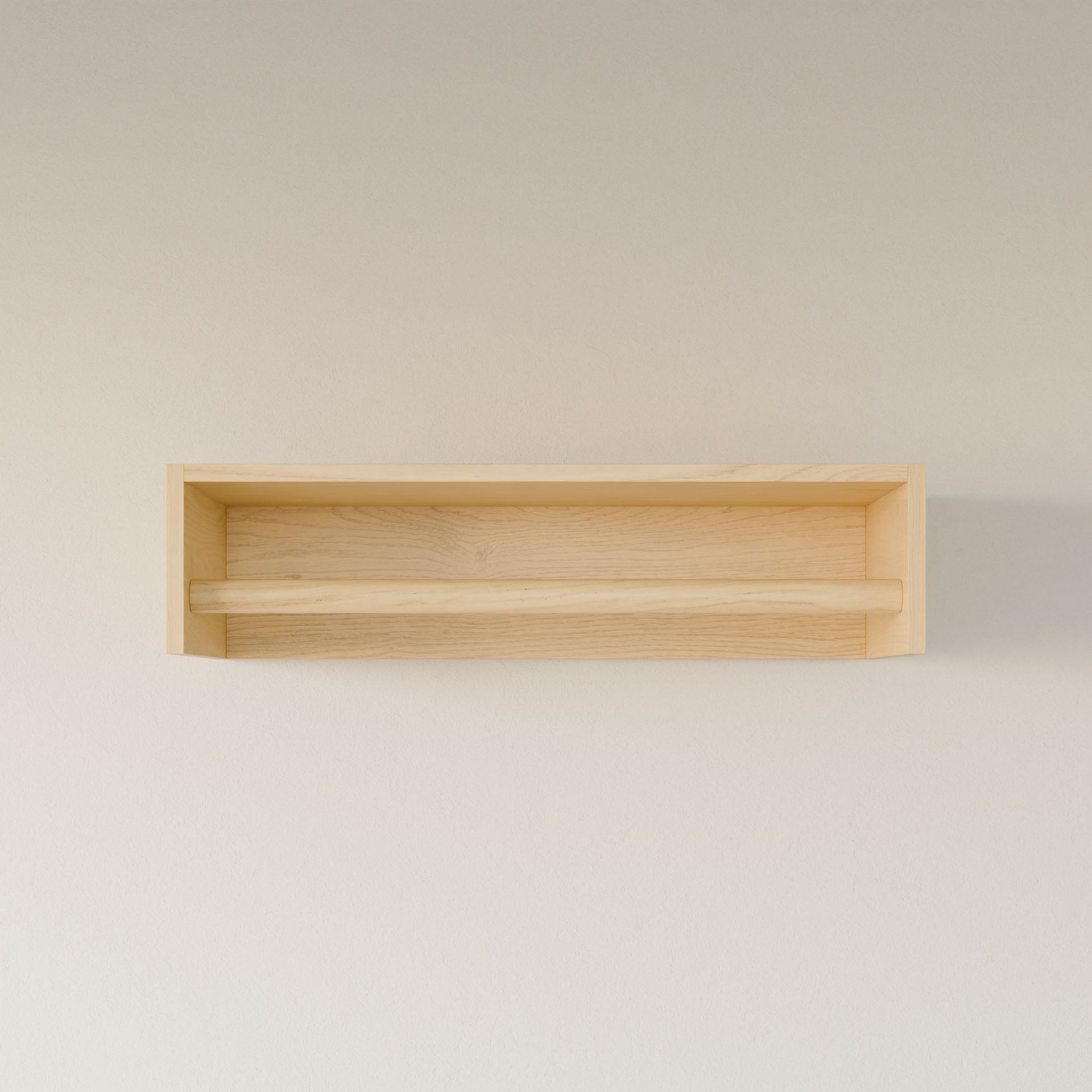 The Closet Hanger in Maple by Krovel Furniture Co. is a minimalist, handmade wooden rectangular shelf from Portland, Maine. Made with premium-grade plywood, it features a simple design with one horizontal support bar and a light natural wood finish to hang on your plain wall.