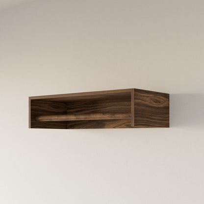 The Closet Hanger in Walnut by Krovel Furniture Co. features a rectangular, natural wood grain design crafted from premium plywood. Its open front easily mounts on a light wall, offering both elegance and practicality to any room.