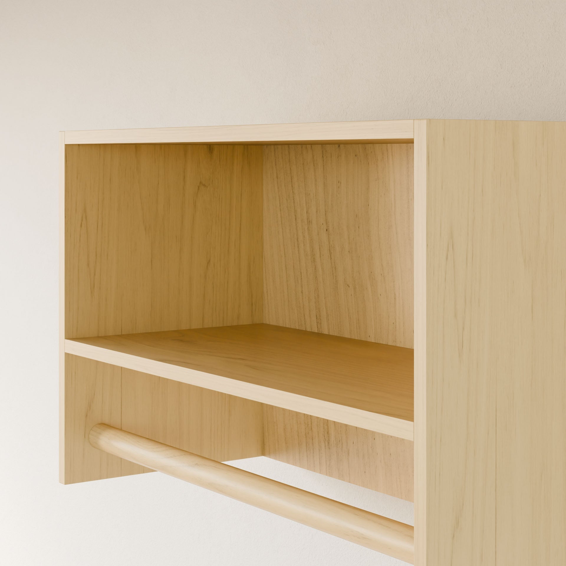 Krovel Furniture Co.'s Closet Hanger with Shelf in Maple, crafted from premium cabinet plywood, is a minimalist light wood shelf on a beige wall. It includes two open compartments and a horizontal rod for hanging items, showcasing elegant functionality and quality craftsmanship.