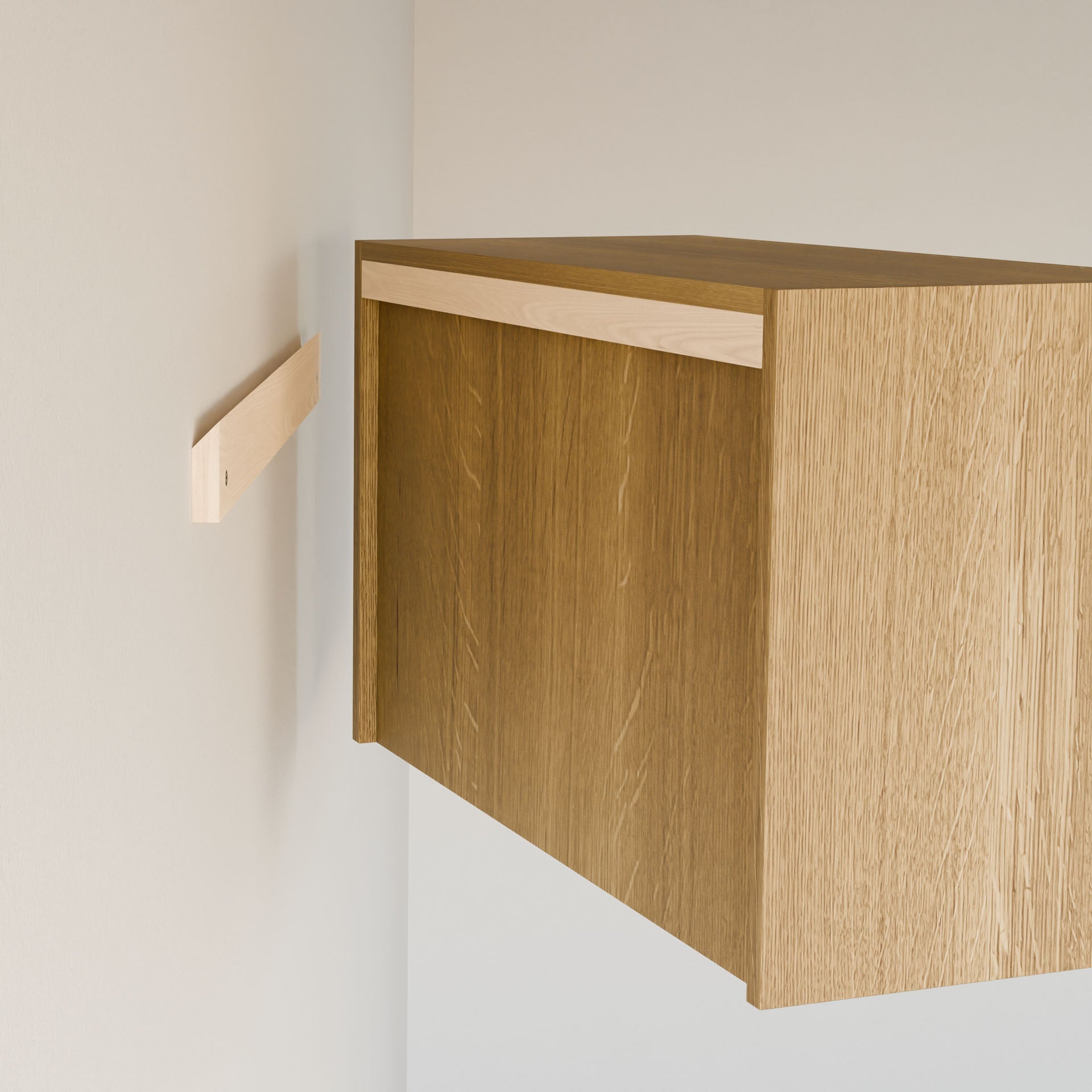 A wooden cabinet, partially attached to a light beige wall with a premium-grade plywood bracket, has a natural finish that showcases its grain patterns. The Krovel Furniture Co.'s Closet Hanger with Shelf in White Oak complements the customizable closet design, matching the cabinet's color perfectly.