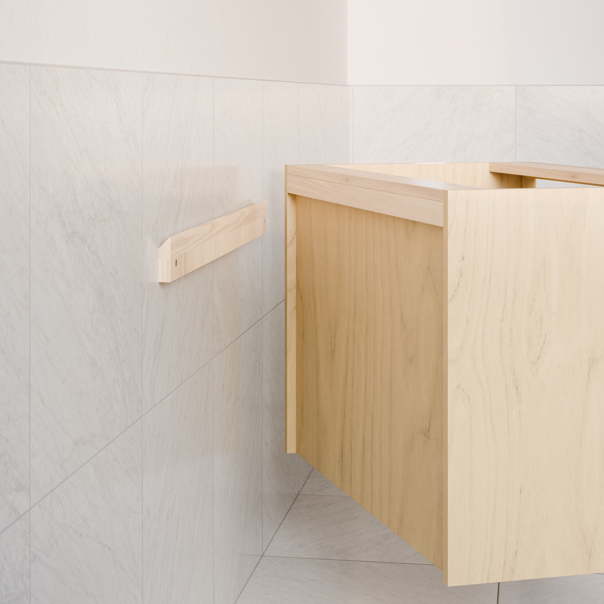 The Double Door Vanity in Maple by Krovel Furniture Co. features a minimalist design with hardwood veneer, wall-mounted with a light wood bracket, and placed against white marble tile walls. Its sleek aesthetic is enhanced by soft-close hinges for a modern touch.