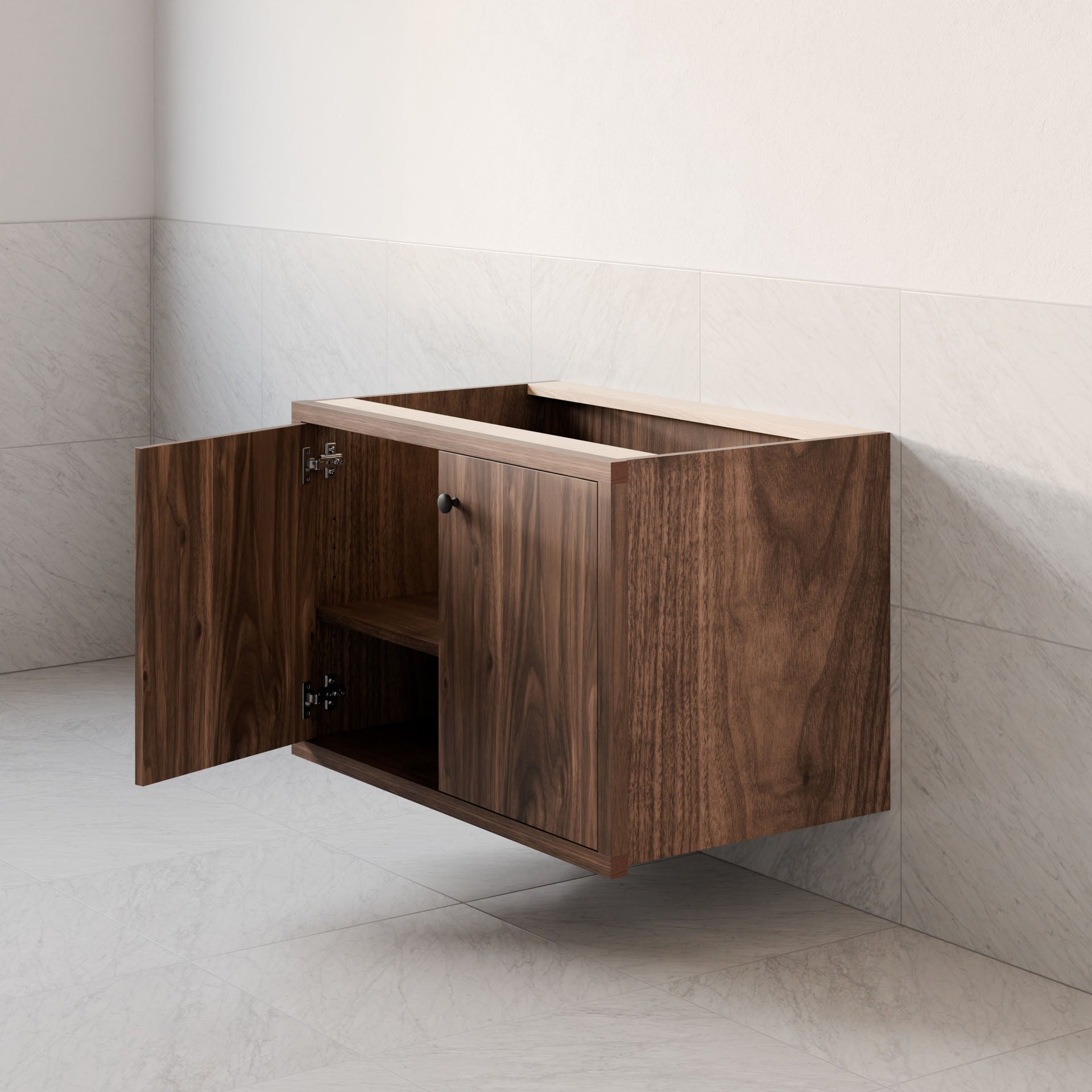 The Double Door Vanity in Walnut by Krovel Furniture Co. is a floating, hardwood veneer piece with a wall-mounted cabinet featuring one open and one closed door, revealing an empty shelf. It stands against a light-tiled wall and floor, combining simple elegance and modern design with soft-close hinges.