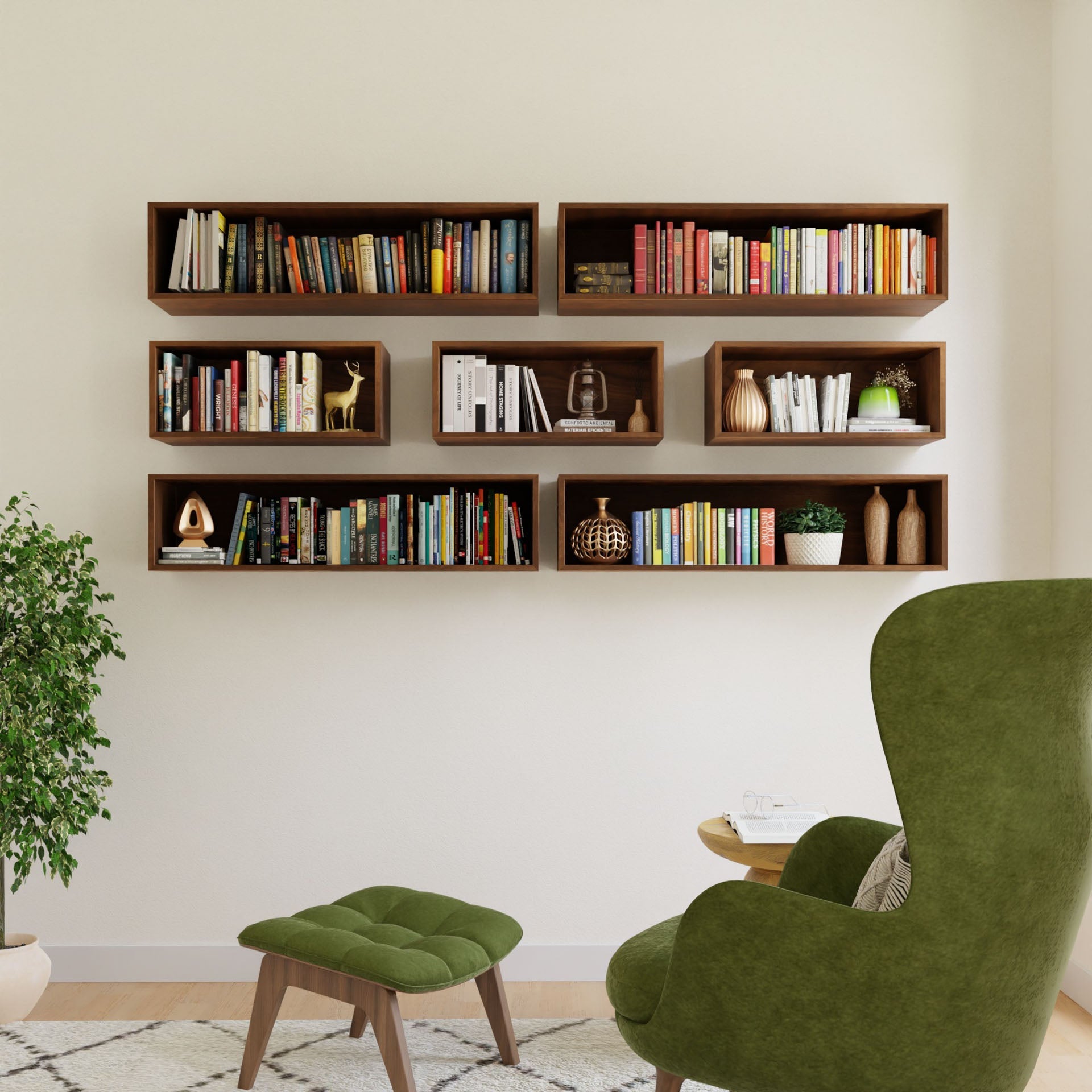 A cozy reading nook showcases a green upholstered armchair with footstool, Krovel's Floating Bookshelf in Walnut displaying books and decor, and a potted plant on a light rug adding greenery.