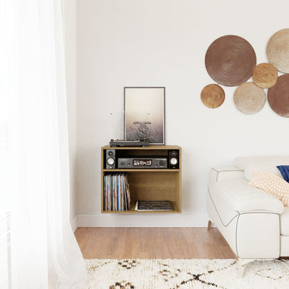 A minimalist living room features a white oak Record and Stereo Storage Cabinet by Krovel, adorned with a stack of vinyl records and complemented by a framed art piece. Decorative circular wall art hangs above the white sofa, enhancing the room's light and airy, Mid-Century Modern vibe.