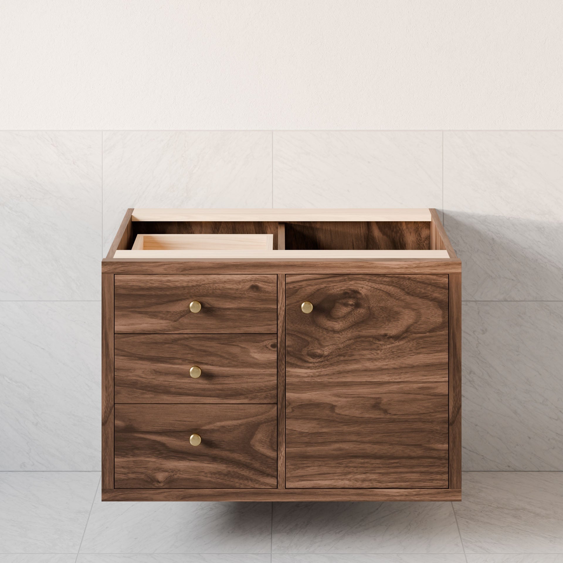 The Krovel Furniture Co. Single Door, Triple Drawer Vanity in Walnut enhances the light tile wall with a natural grain hardwood veneer, left-side drawers featuring round golden knobs, and a right cabinet door. Soft-close hinges ensure smooth operation while the open top offers versatility.