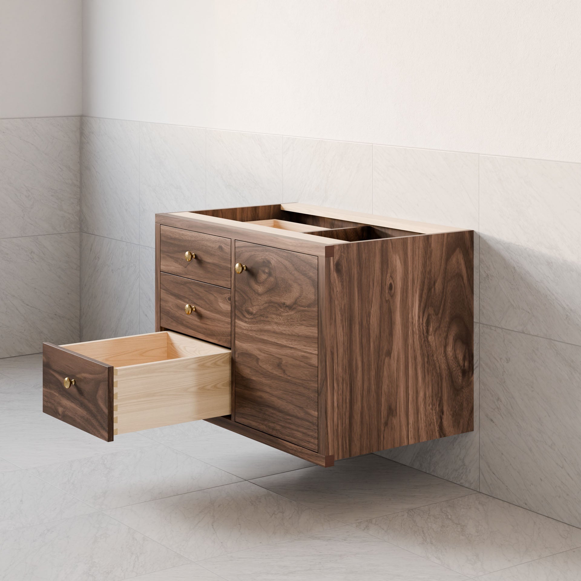 A Single Door, Triple Drawer Vanity in Walnut from Krovel Furniture Co. is mounted on a tiled wall. It features two open drawers, showing a lighter wood interior with brass-colored knobs that enhance its elegant hardwood veneer and soft-close hinges.