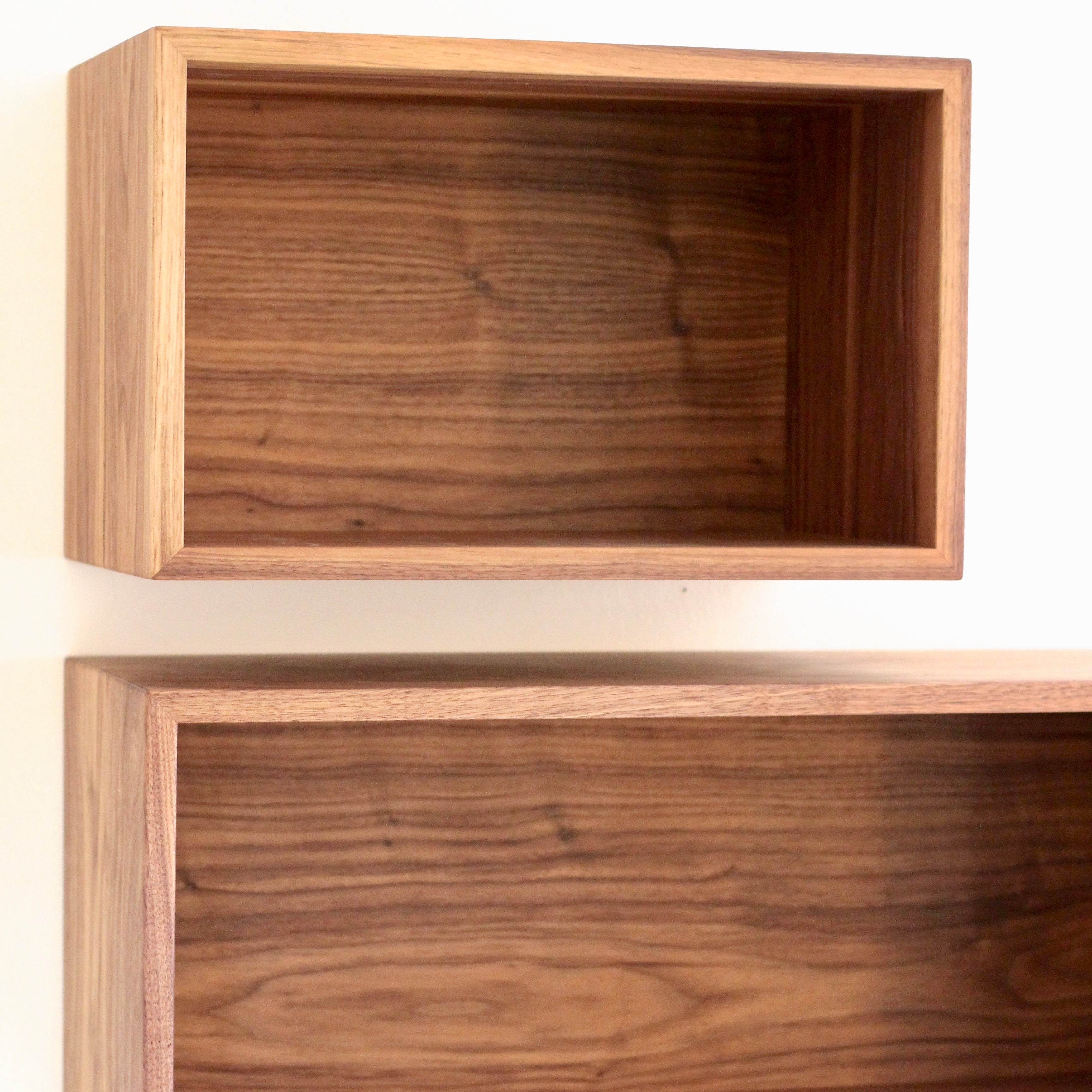 https://krovelmade.com/cdn/shop/products/floating-storage-cabinet-in-walnut-storage-cabinet-krovel-furniture-co-29519059058848.jpg?v=1695990919